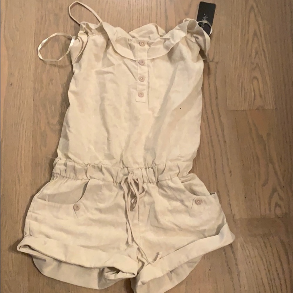 cream romper never worn